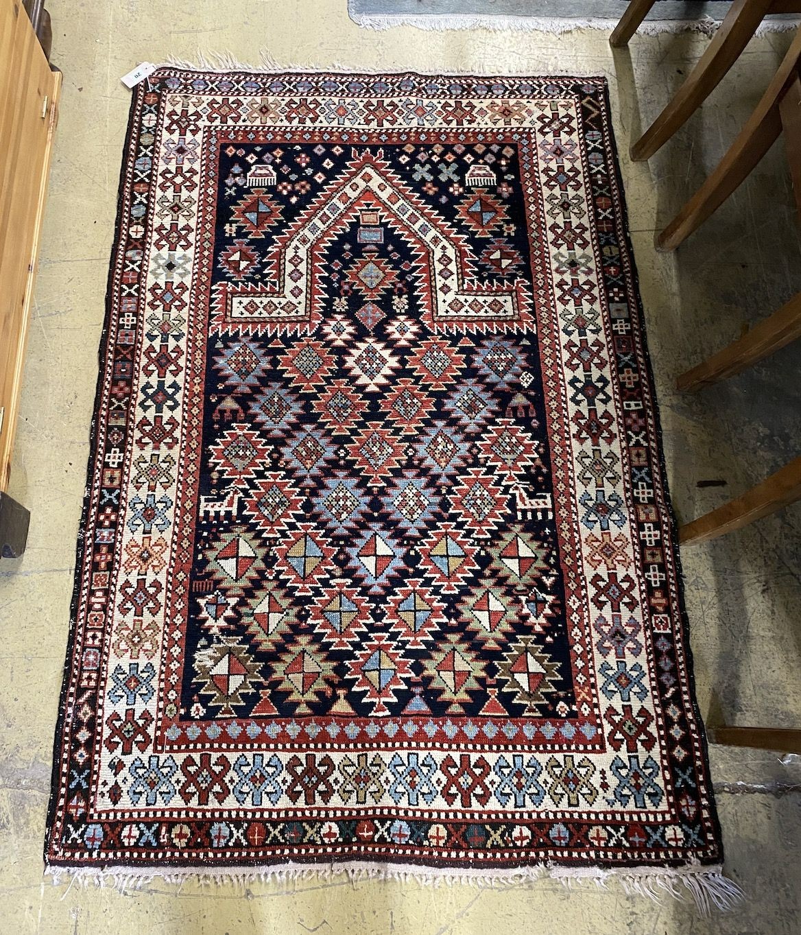 A Caucasian blue ground prayer rug, 153 x 102cm